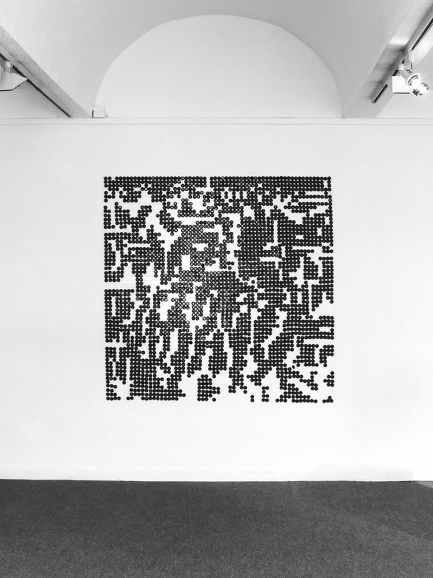 Sarah Lundy, Habit [Ritual &amp; The Rebel], beer bottle caps in QR-esque format on wall, 2013