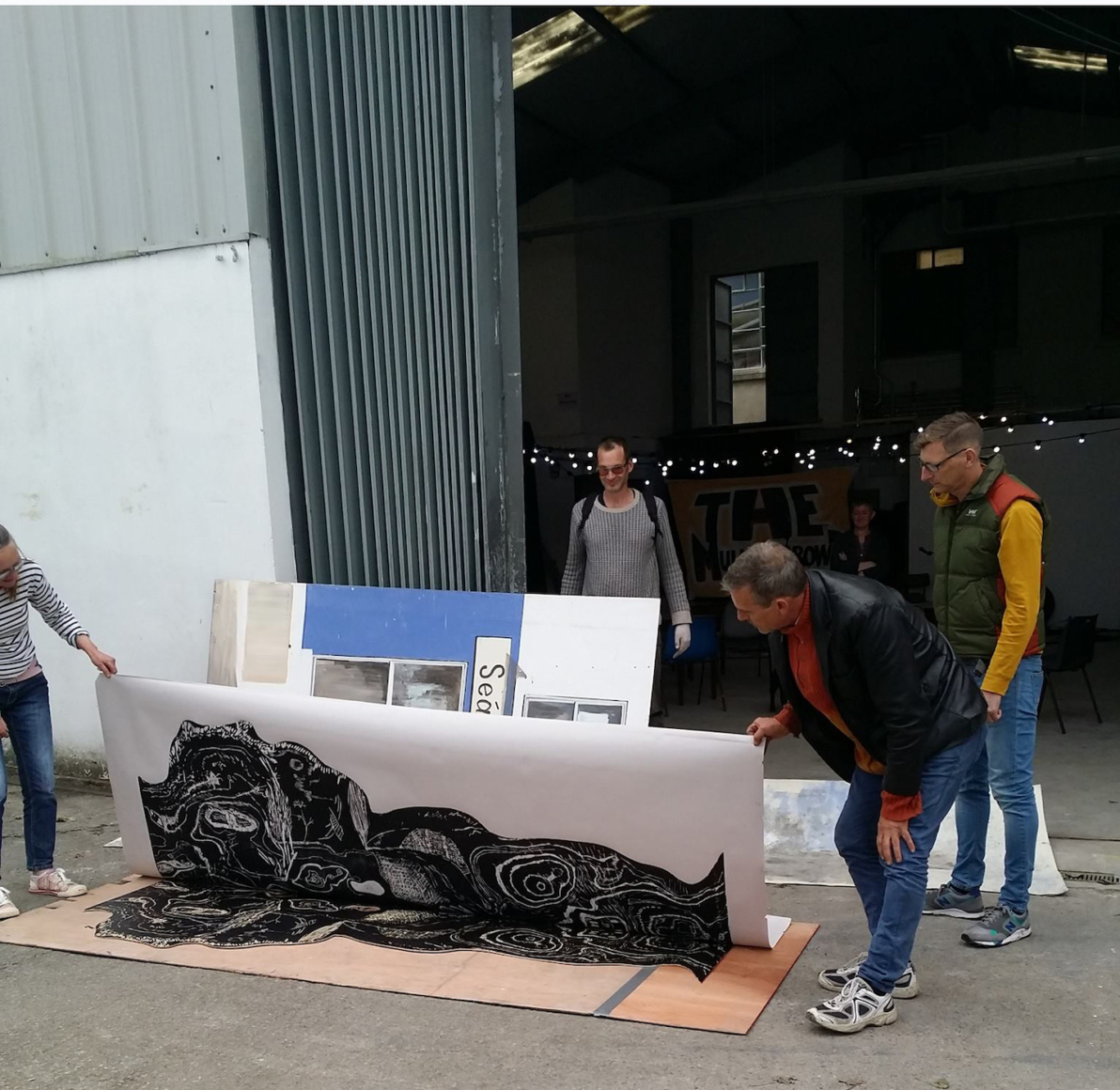 Phoebe Dick and Liz Byrne, an image of a section of a large woodblock collaboratively created during the Evidence of Small Behaviours symposium, printed using the Leitrim Sculpture Centre forklift, 2015.