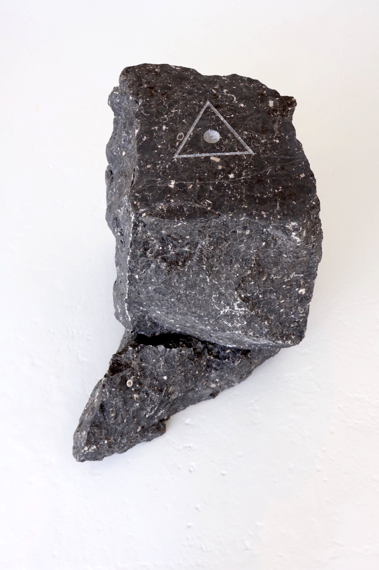 To the Mountain 2024
Limestone from Trotter’s Quarry, Leitrim carved by Seamus Dunbar. The symbol is of a trig point found on mountains and sites of elevation on a map. Photo by Sean Borodale.