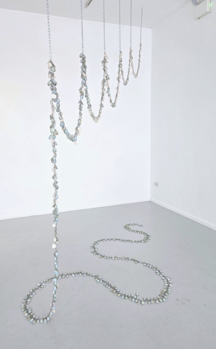 Only Crooked Paths to Transformation, view 1, 2026, porcelain glaze steel in installation, 116x116x51 inches.