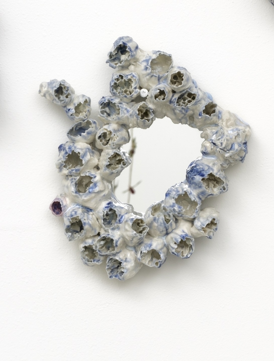 Kate Rusek, The ocean provides a closer reflection of who we are than any mirror, 2024 
Porcelain glaze glass mirror 12x10x4inches