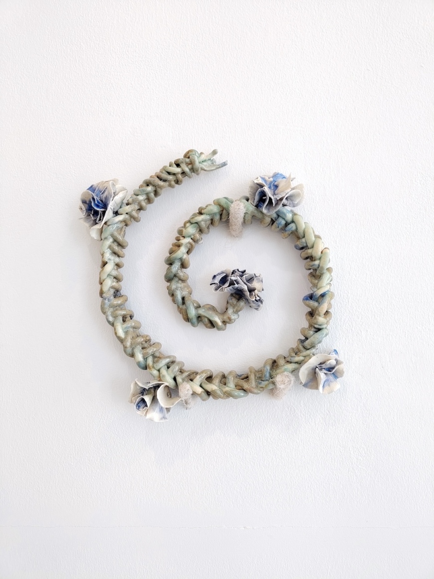 Walking and Weaving sheeps bit, 2026, stoneware glaze foraged wool steel 14x14x3 inches